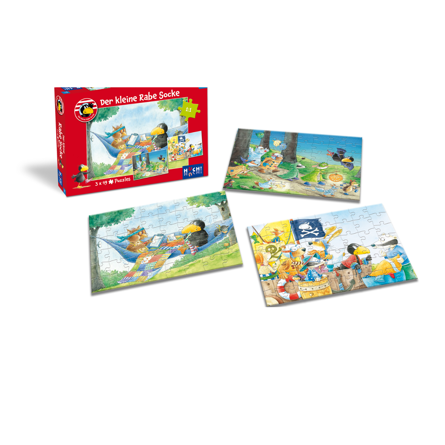 Schachtel und drei fertige Puzzles aus „Der kleine Rabe Socke – Puzzle 3x49 Teile“ mit Comic-Tieren und verspielten Szenen aus der Kinderfreundschaft.
