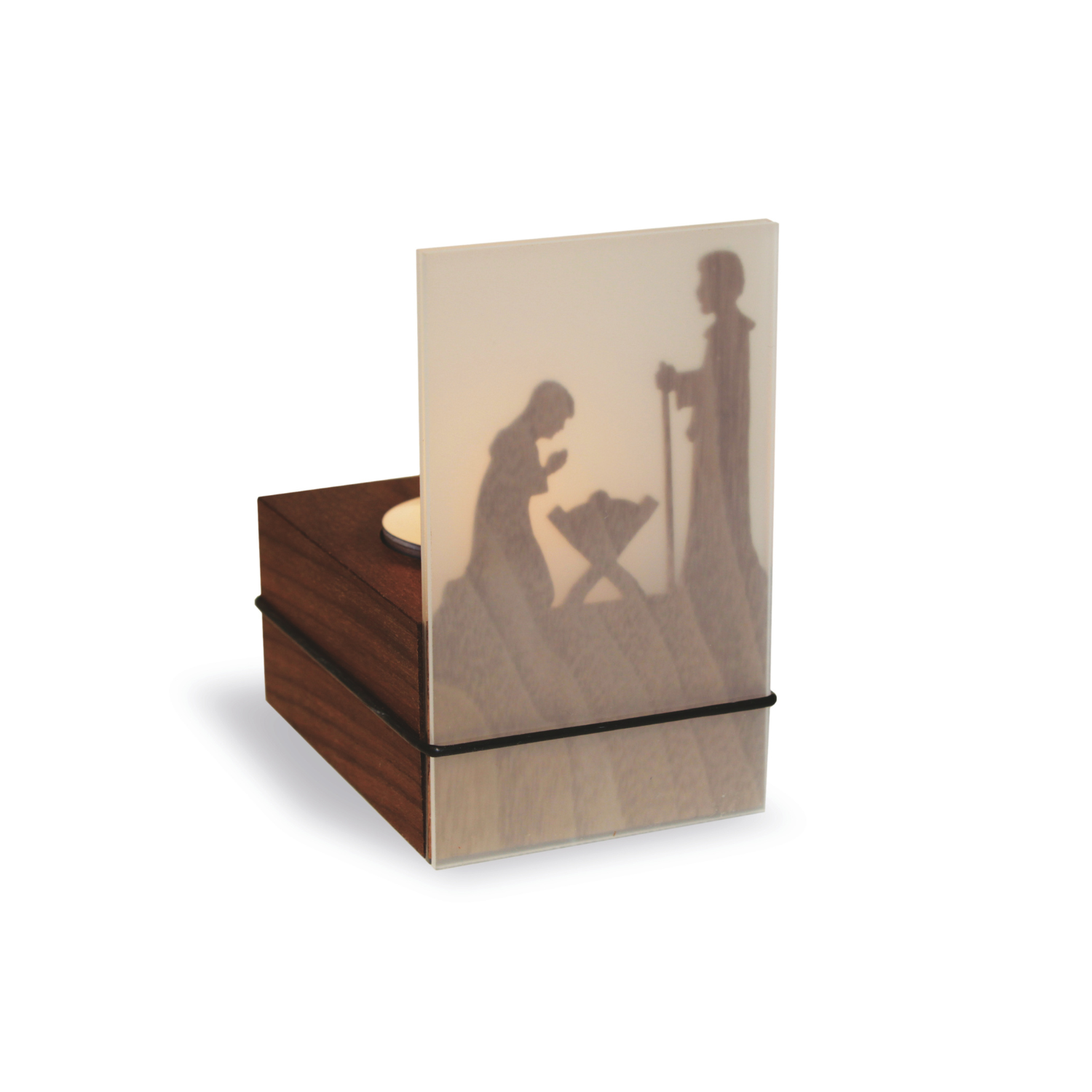 Der Teelichthalter "Schattenspiel Krippe" projiziert Figuren auf Milchglas.