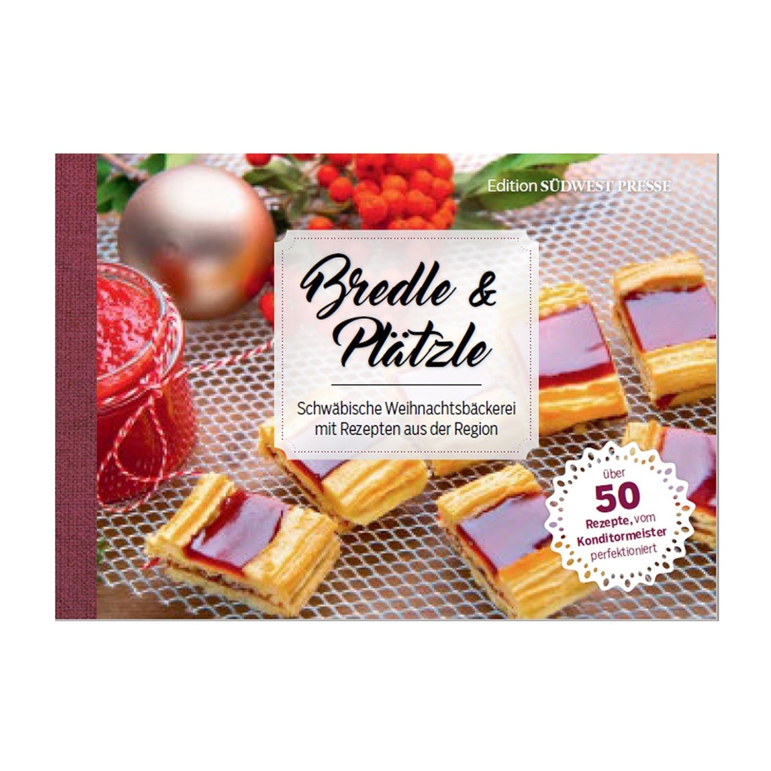 „Bredle & Plätzle“ präsentiert ein charmantes Cover mit Weihnachtsplätzchen und roter Marmelade auf rustikalem Hintergrund. Mit den Erkenntnissen von Konditormeister Thomas Eckhardt bietet dieses Kochbuch über 50 regionale Plätzchenrezepte zum Verfeinern Ihrer Weihnachtsbäckerei.