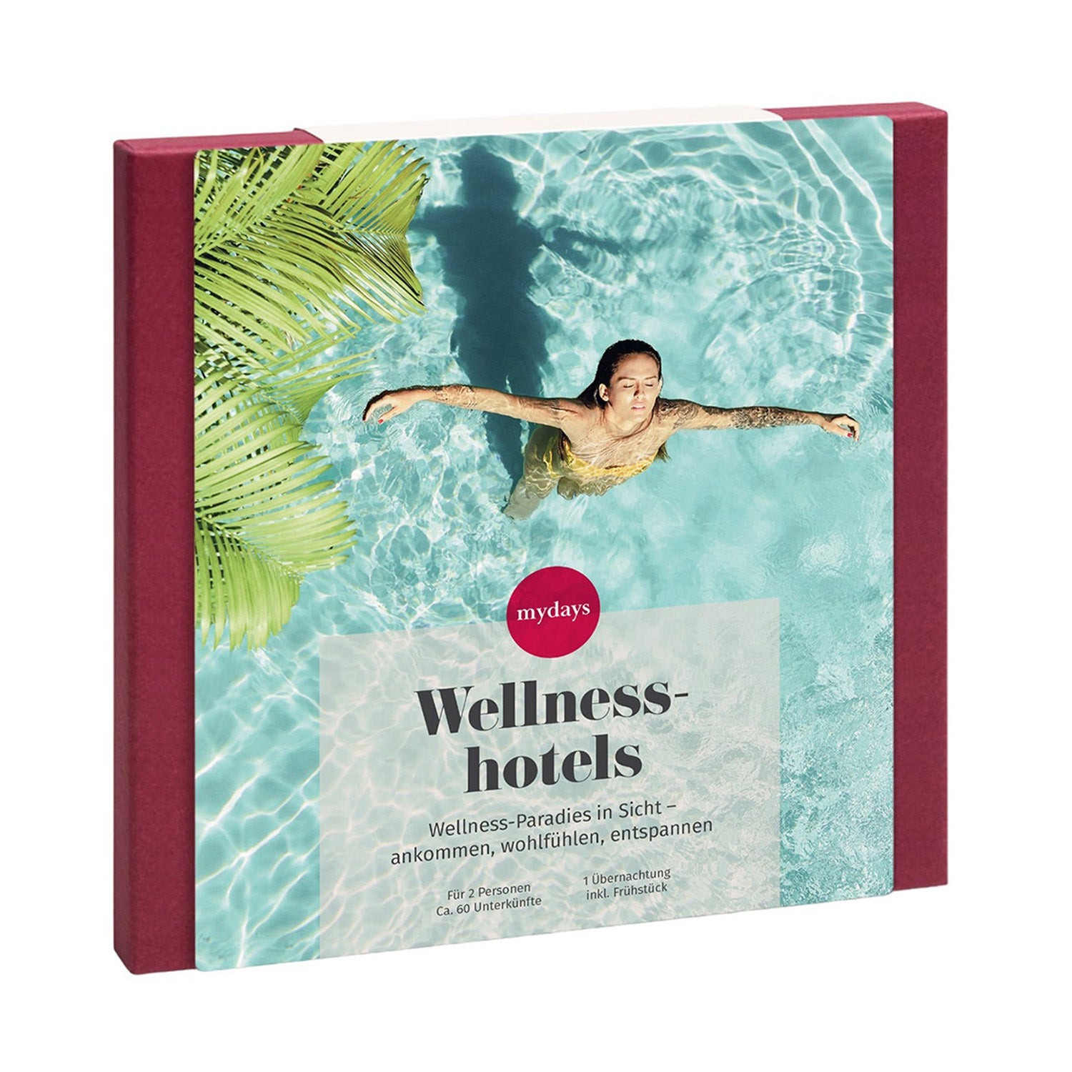 Das rot umrandete Paket der Erlebnis-Box Wellnesshotels zeigt das ruhige Bild einer Person, die in einem klaren blauen Pool inmitten üppiger grüner Blätter schwimmt, und beschreibt ein luxuriöses Wellness-Erlebnis in den Spa-Bereichen.
