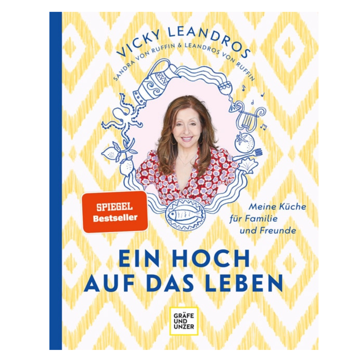 Kochbuchcover mit lächelnder Frau, Utensilien und deutschem Text EIN HOCH AUF DAS LEBEN – ideal für Fans von Familienküche und griechischen Rezepten. Produkt: Ein Hoch auf das Leben – Vicky Leandros.