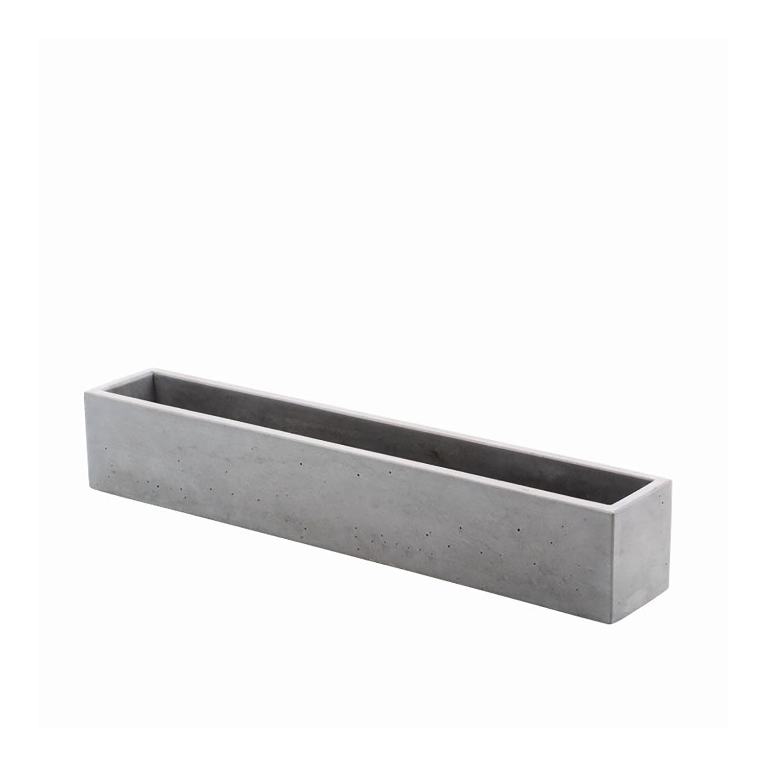 Ein langer, rechteckiger Blumenkasten aus grauem Beton mit minimalistischem Design steht vor einem schlichten weißen Hintergrund.