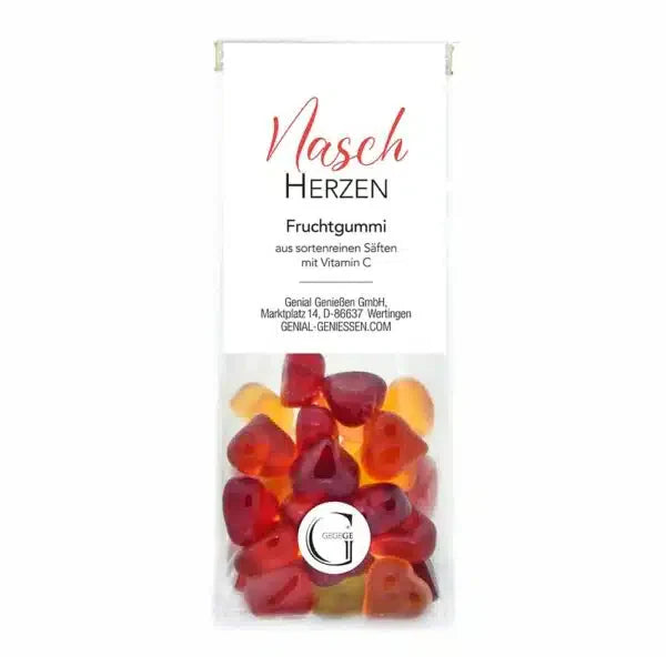 Eine durchsichtige Tüte mit herzförmigen Fruchtgummis mit der Aufschrift Nasch Herzen.