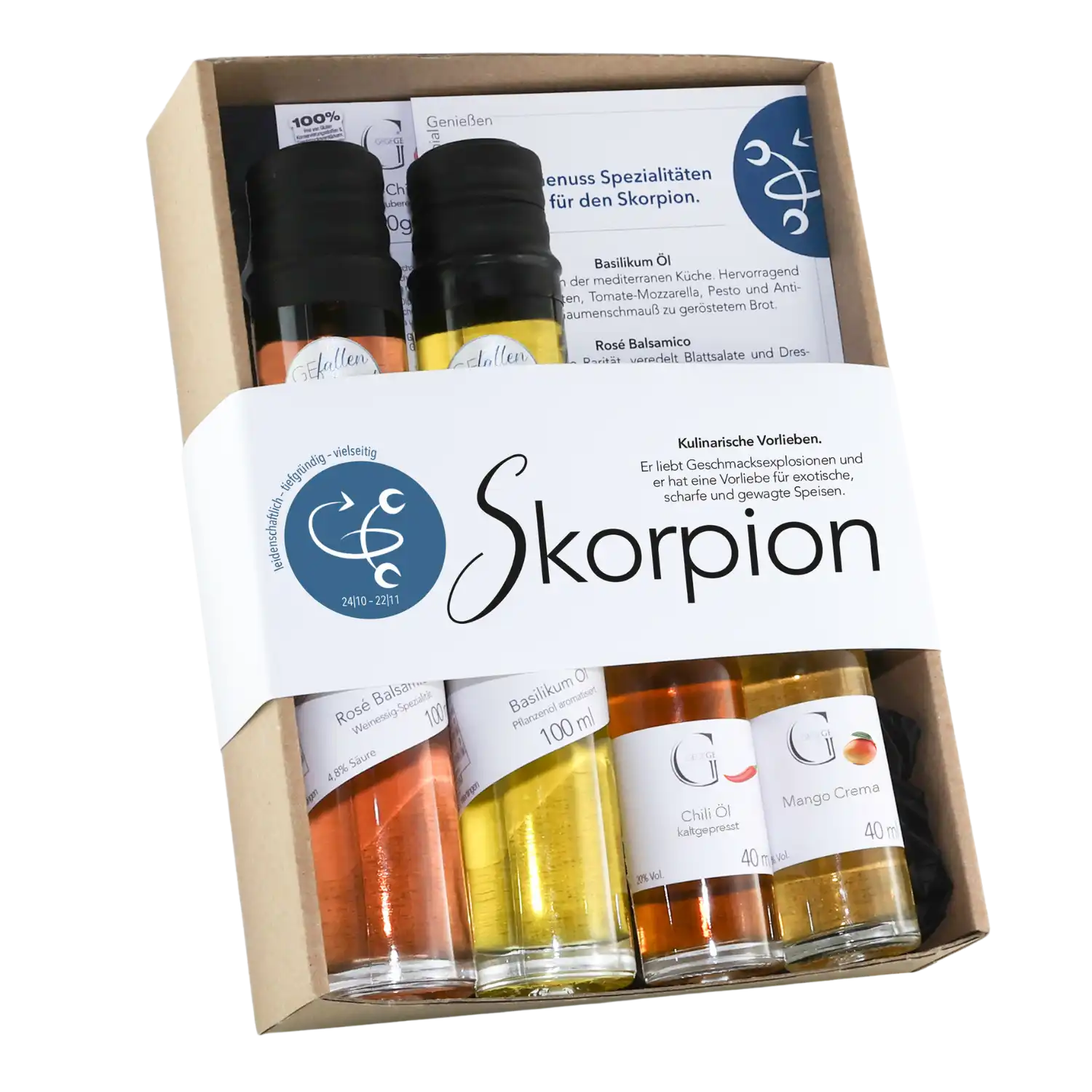 Das Sternzeichen-Set – Skorpion beinhaltet drei Glasflaschen – Basilikumöl, Chiliöl und Mangocreme – mit exotischen Aromen sowie Informationskarten, alles verpackt in einer Geschenkbox.
