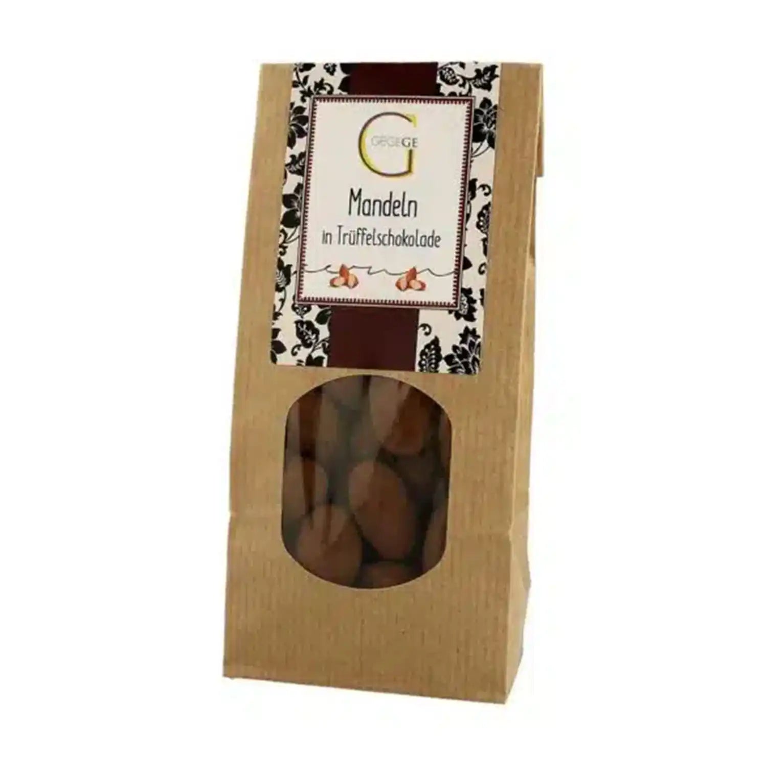 Eine braune Papiertüte mit schokoladenüberzogenen Mandeln mit einem dekorativen Etikett.