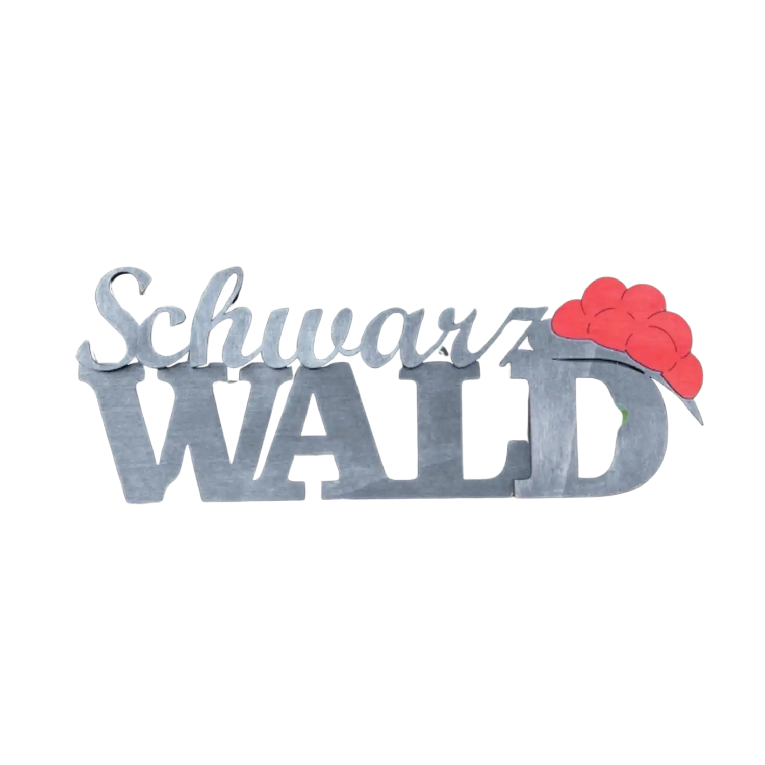 Schwarzwald Schriftzug aus Holz mit roten Pompons als Bollenhut dekoriert.