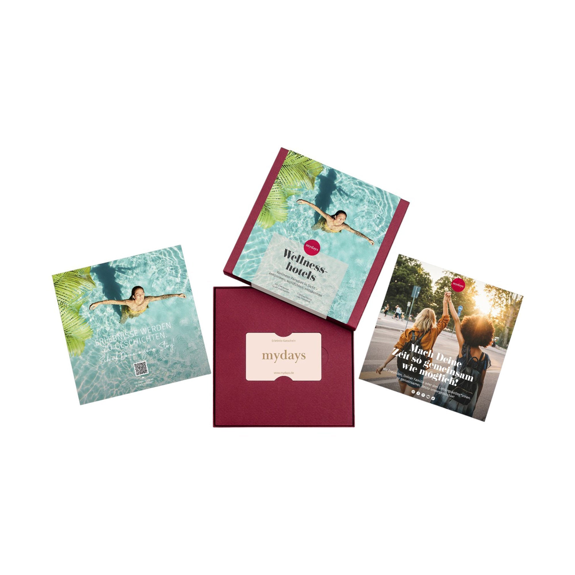 Die Erlebnis-Box Wellnesshotels besteht aus einer eleganten, kastanienbraunen Box mit der Aufschrift „mydays“ und enthält zwei Fotos: eines von einer schwimmenden Frau und ein weiteres von Menschen, die einen Spa-Tag in Premium-Wellnesshotels genießen.